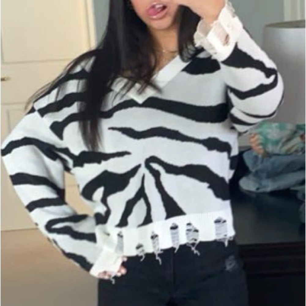 Zebra distressed sweater